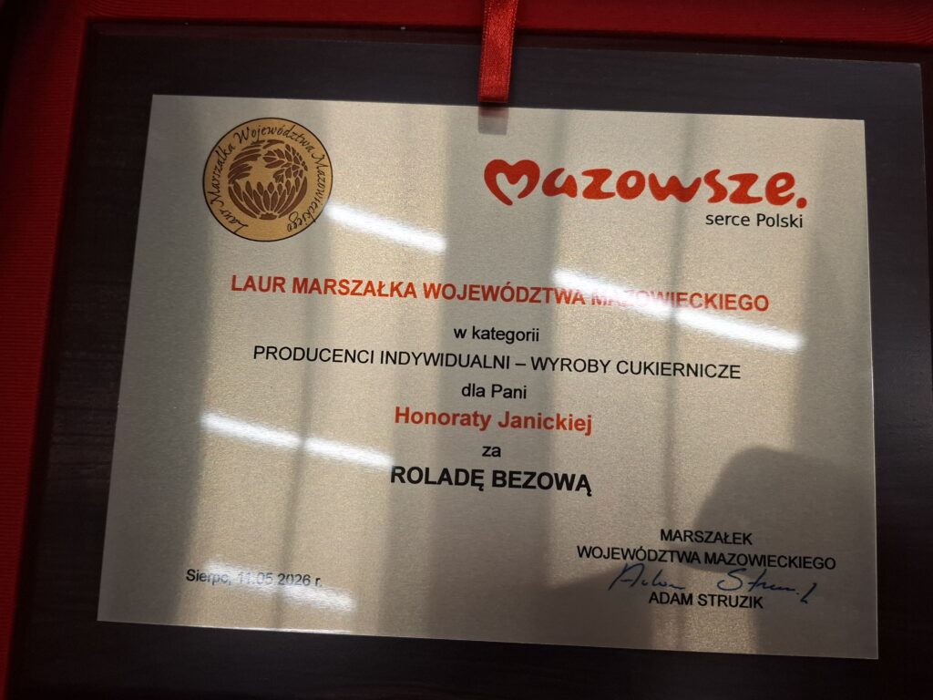 Certyfikat z logo Mazowsze na jasnym tle, wyróżniający Honoratę Janicką za rolady bezowe. Tekst czerwony i czarny.